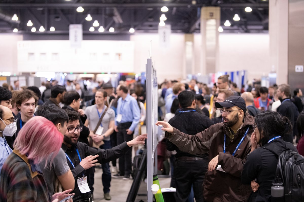 thousands of posters line the pennsylvania convention center for display and interactions among students, a great subject for scientific meeting photography