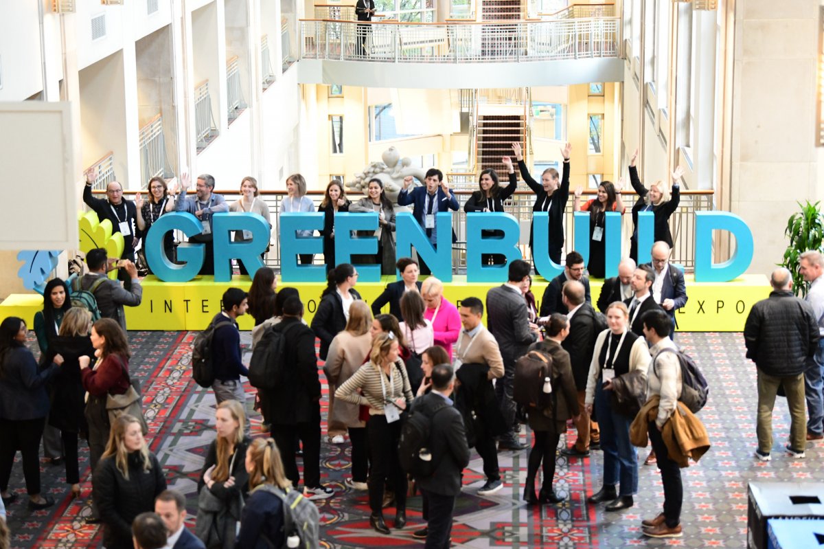 greenbuild conference attendees gathering in convention center lobby